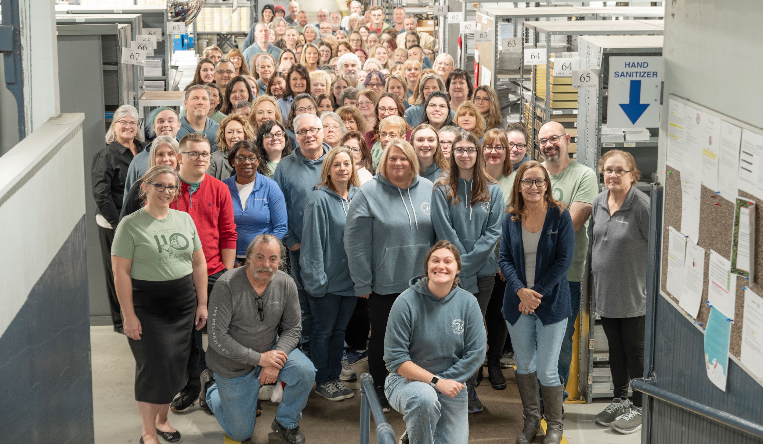 Messenger team members gathered for a company group photograph
