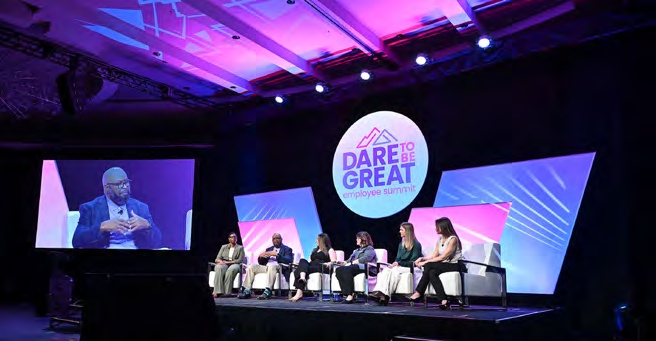 Panelists on stage at Pathward’s Dare to Be Great employee summit