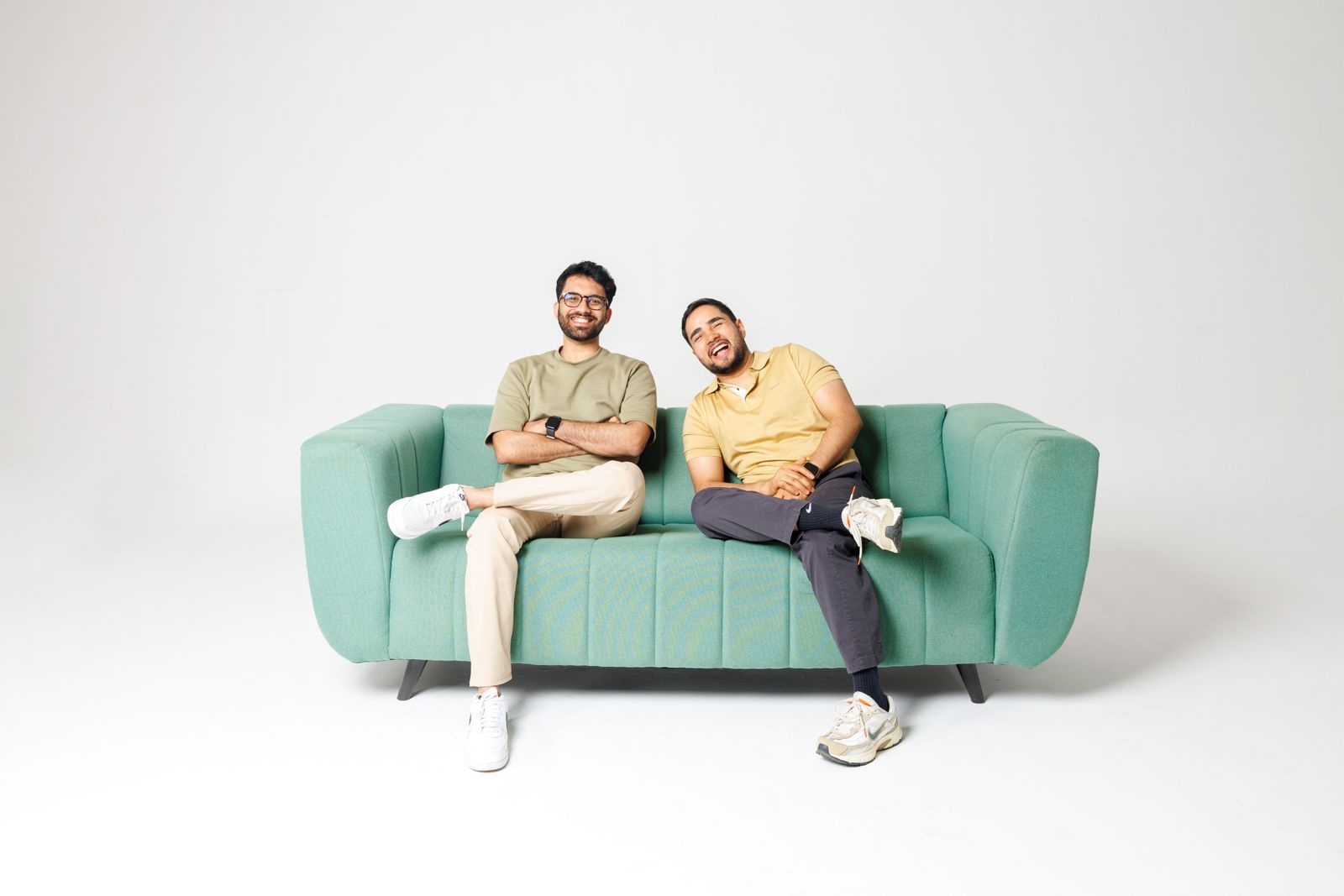 Metaforms co-founders Arjun S, left, and Akshat Tyagi seated on a sofa