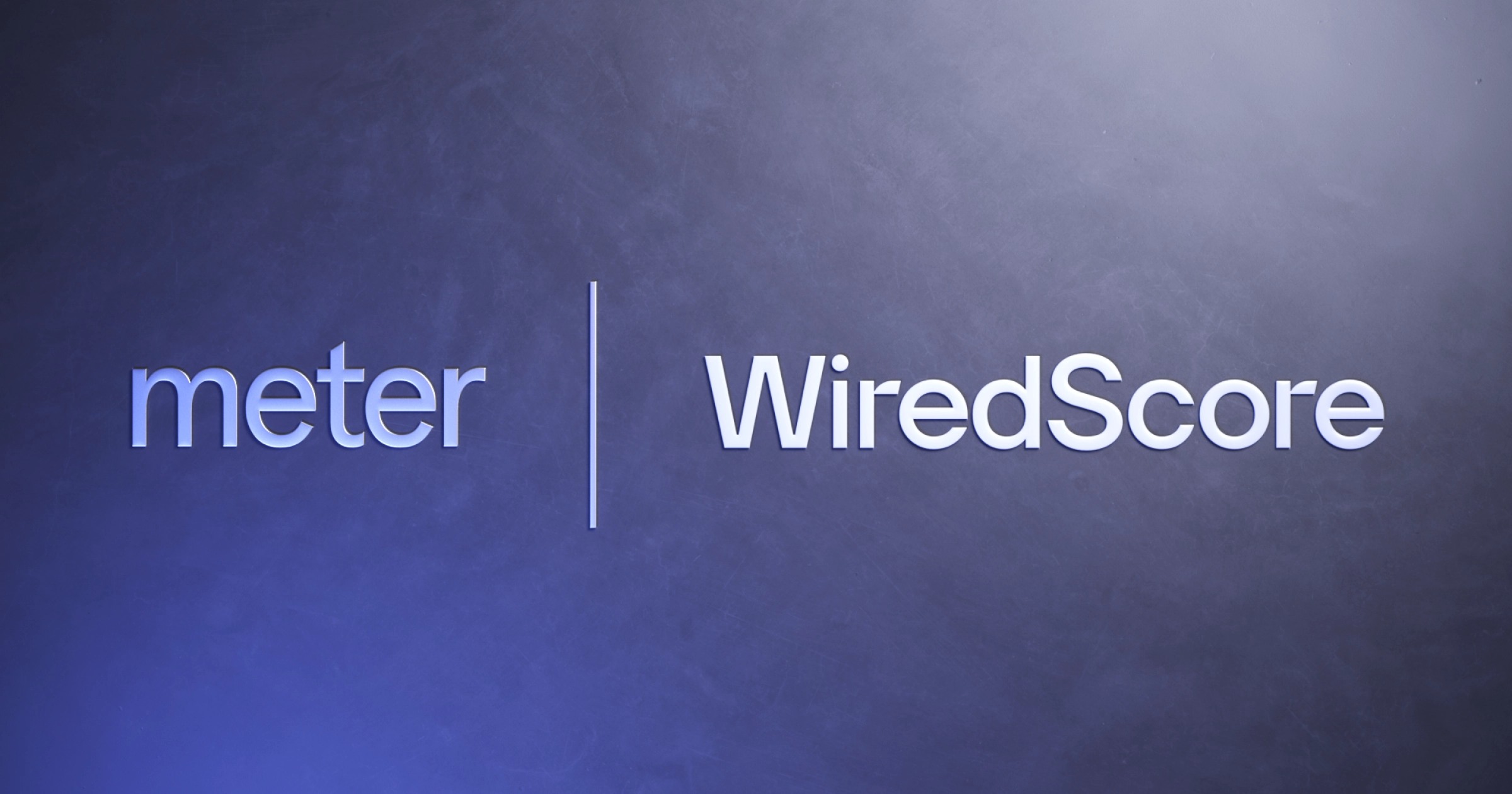 Meter and WiredScore names shown together on a blue background