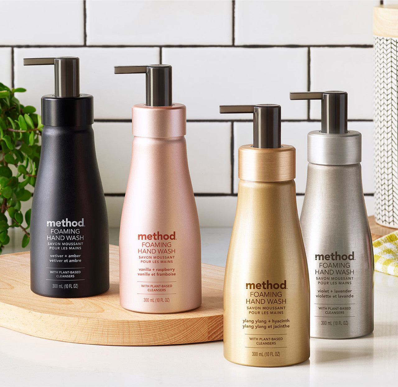 Four Method refillable aluminum hand wash bottles arranged on a counter