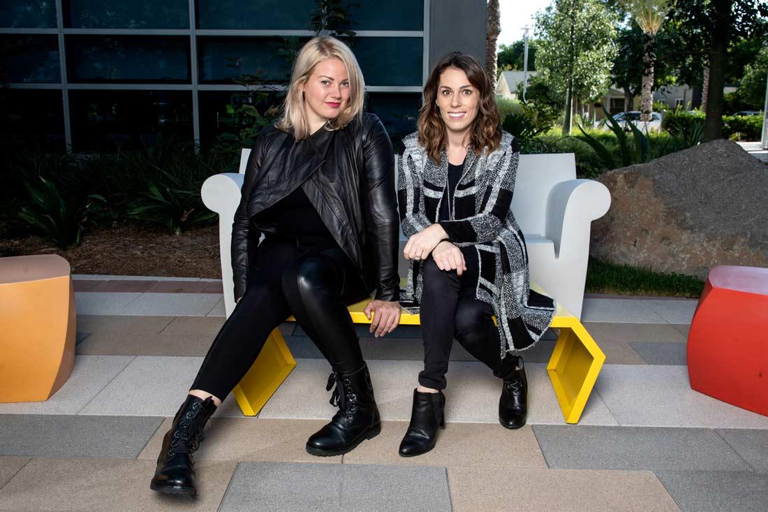 Metro Public Relations founders Tess Finkle and Laura Michael seated together