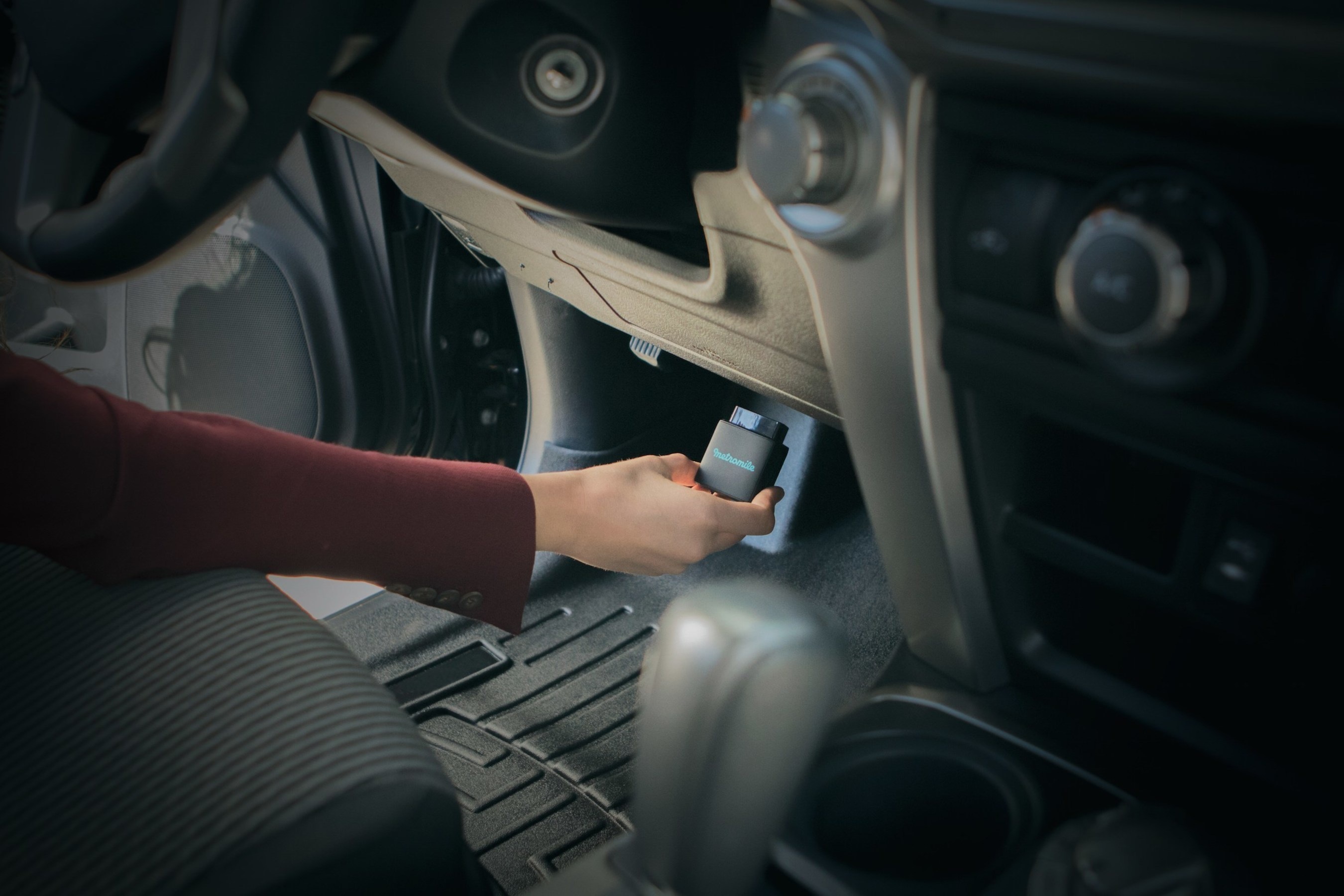 Metromile Pulse telematics device in a company press photograph