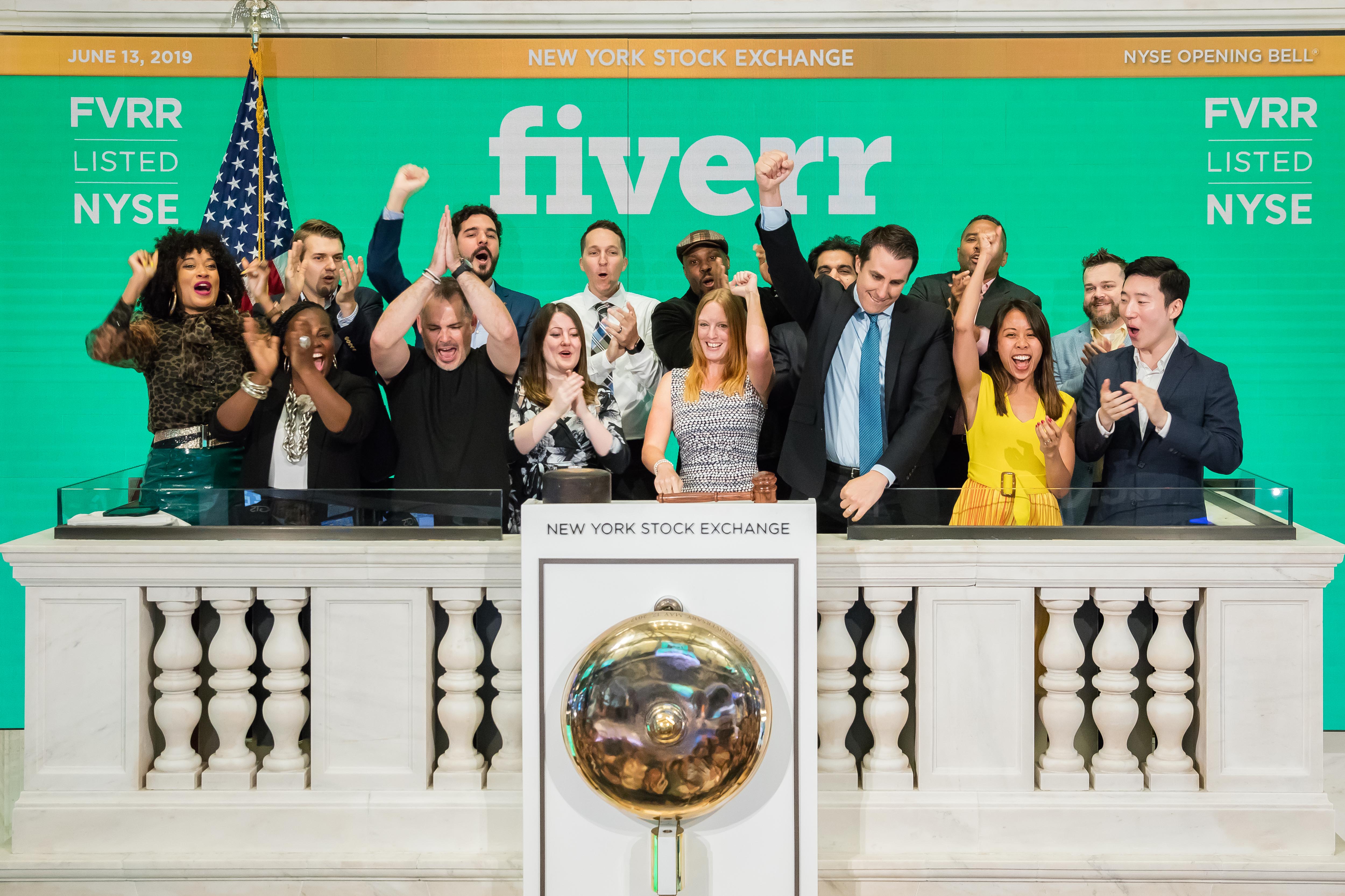 Micha Kaufman claps alongside freelancers and colleagues at Fiverr’s NYSE opening-bell celebration on June 13, 2019.