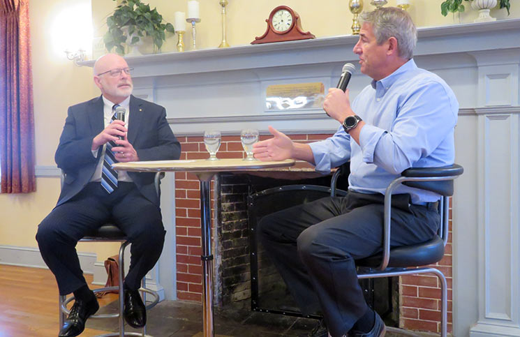 Michael Barrett, right, speaking with John McDonagh at a Boardroom Breakfast event