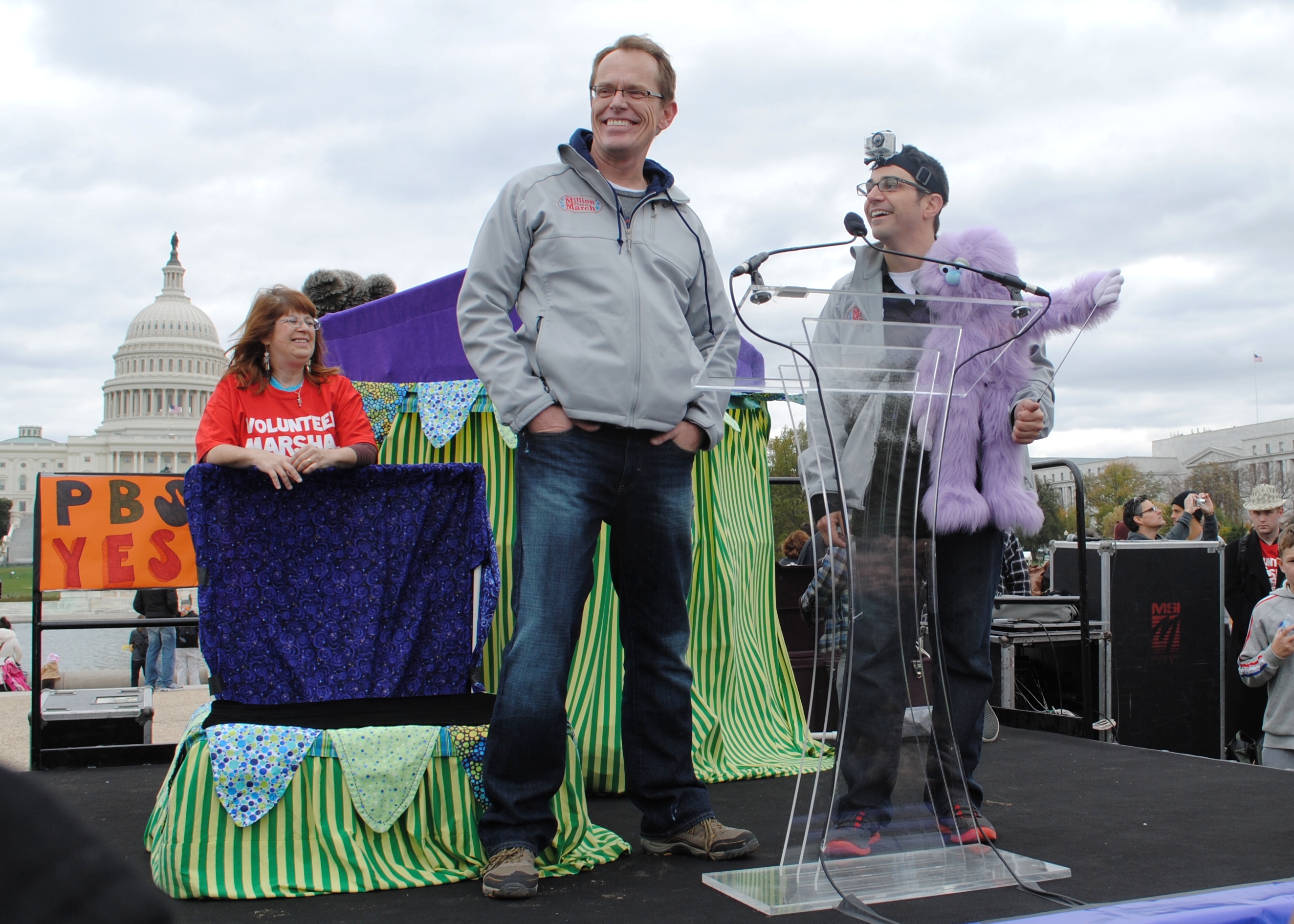 Chris Mecham, left, and Michael Bellavia with a purple puppet at the Million Puppet March near the Capitol