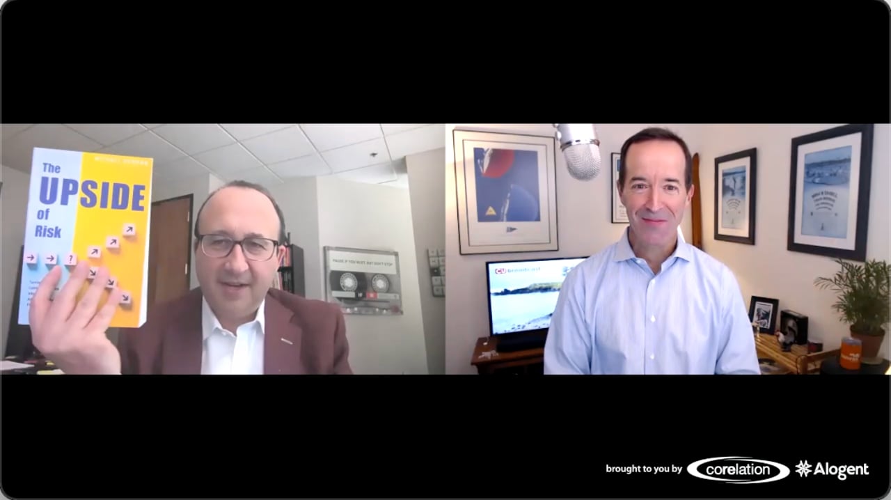 Michael Berman holds The Upside of Risk during a split-screen interview with CUbroadcast