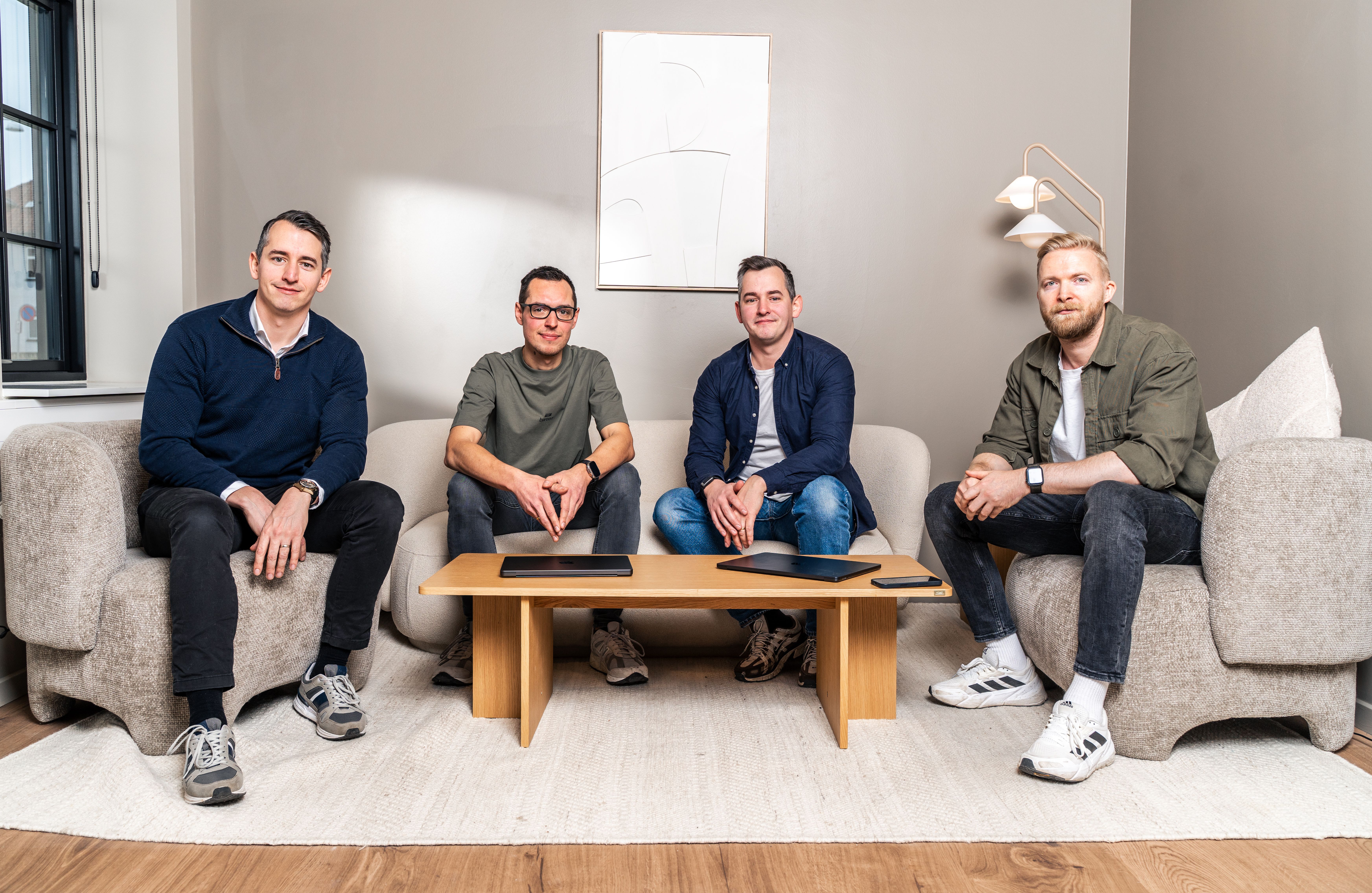 Velatir’s four co-founders seated together, with Michael Blicher Sørensen third from the left