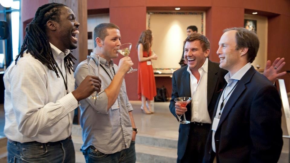 Michael Burcham laughing with fellow entrepreneurs after a Jumpstart Foundry pitch day