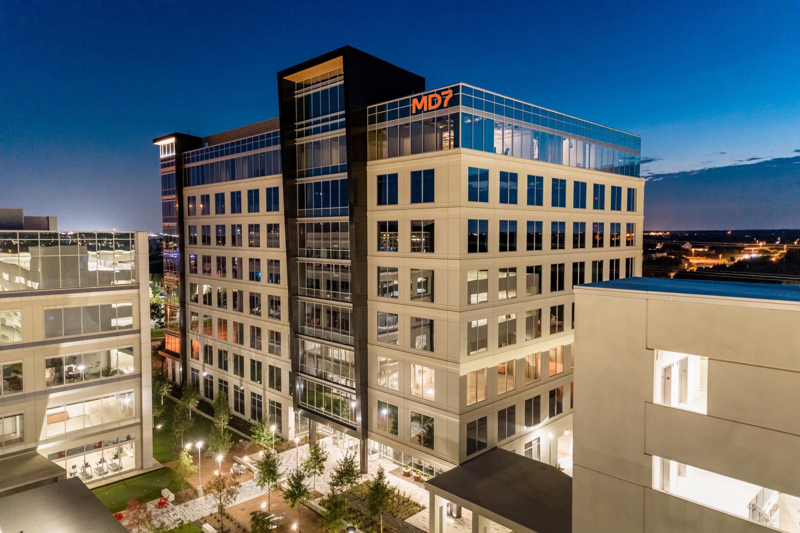MD7’s office building in Allen, Texas, illuminated at dusk