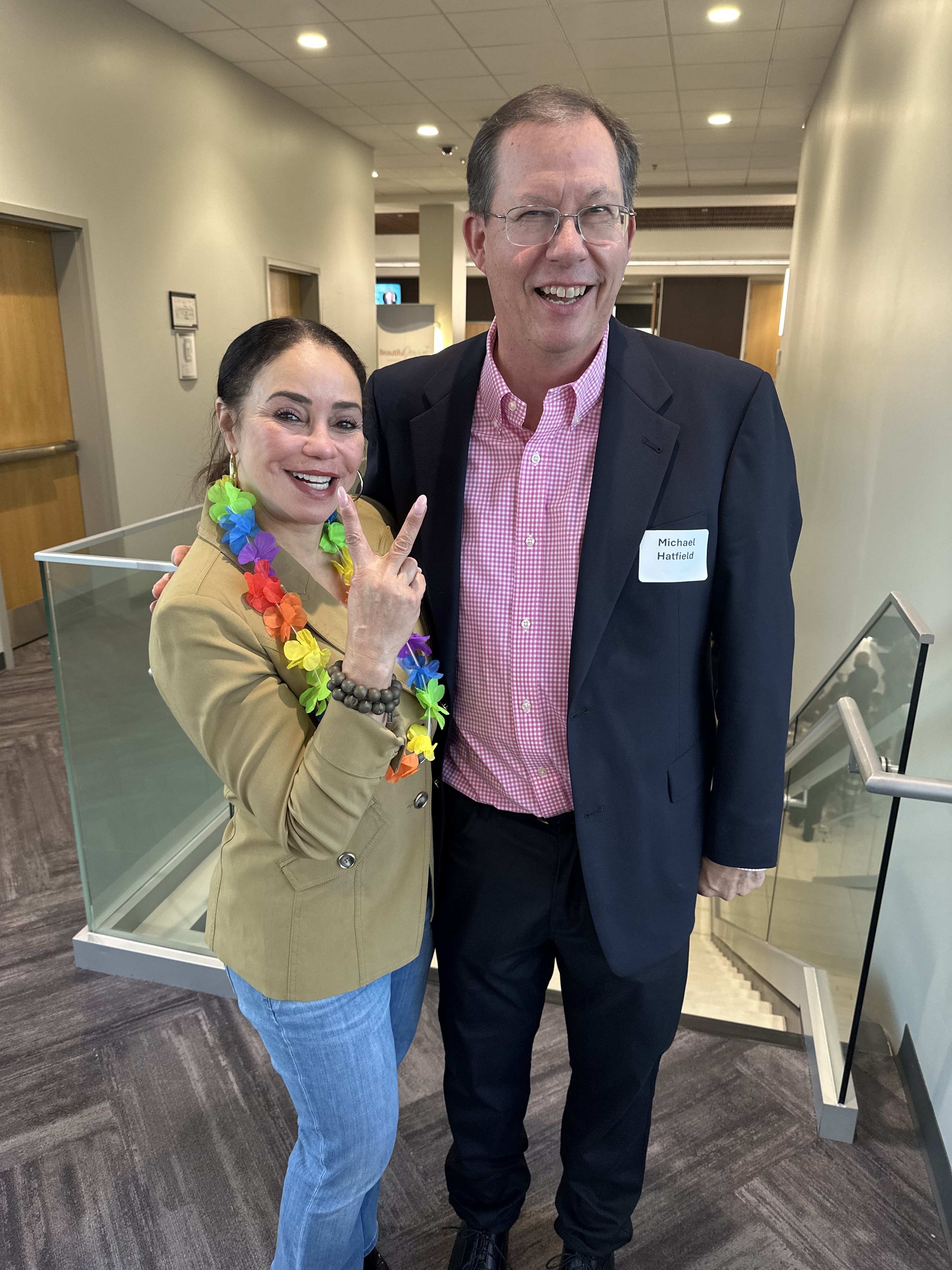 Chere Cofer and Michael Hatfield smiling together at the 2024 Invest In Women Founders Summit