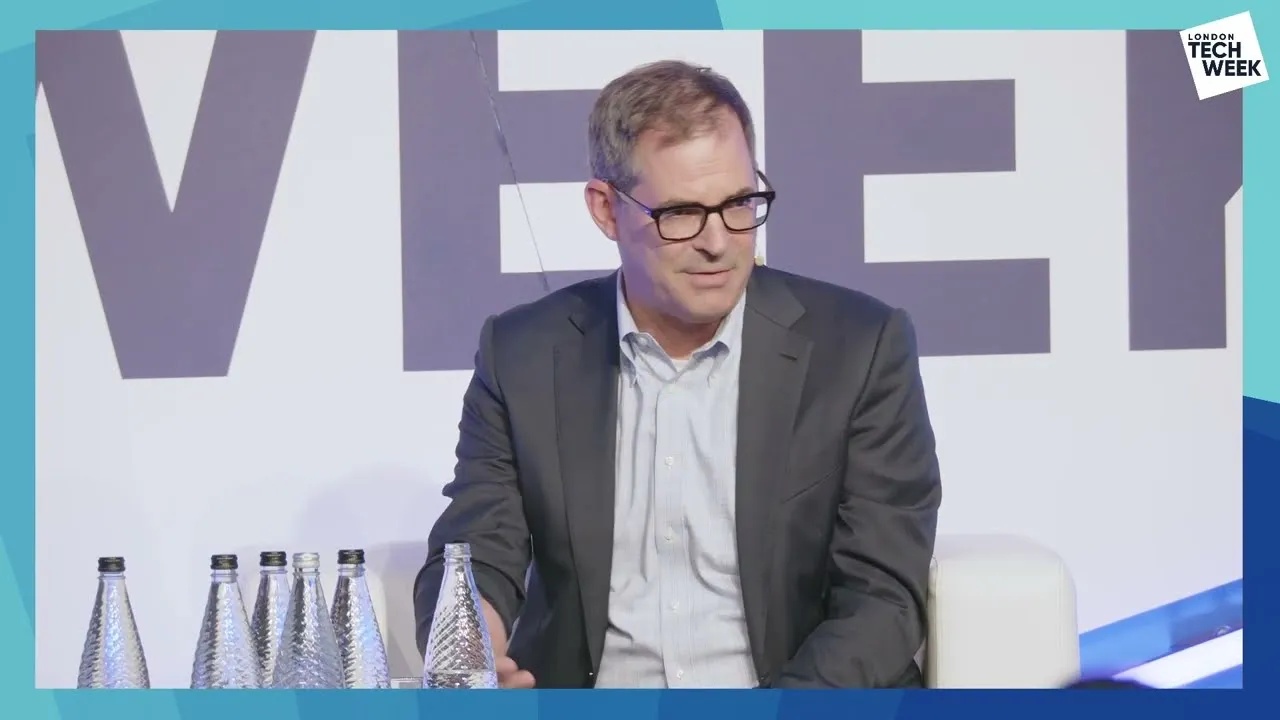 Michael Intrator speaking onstage at London Tech Week in 2024