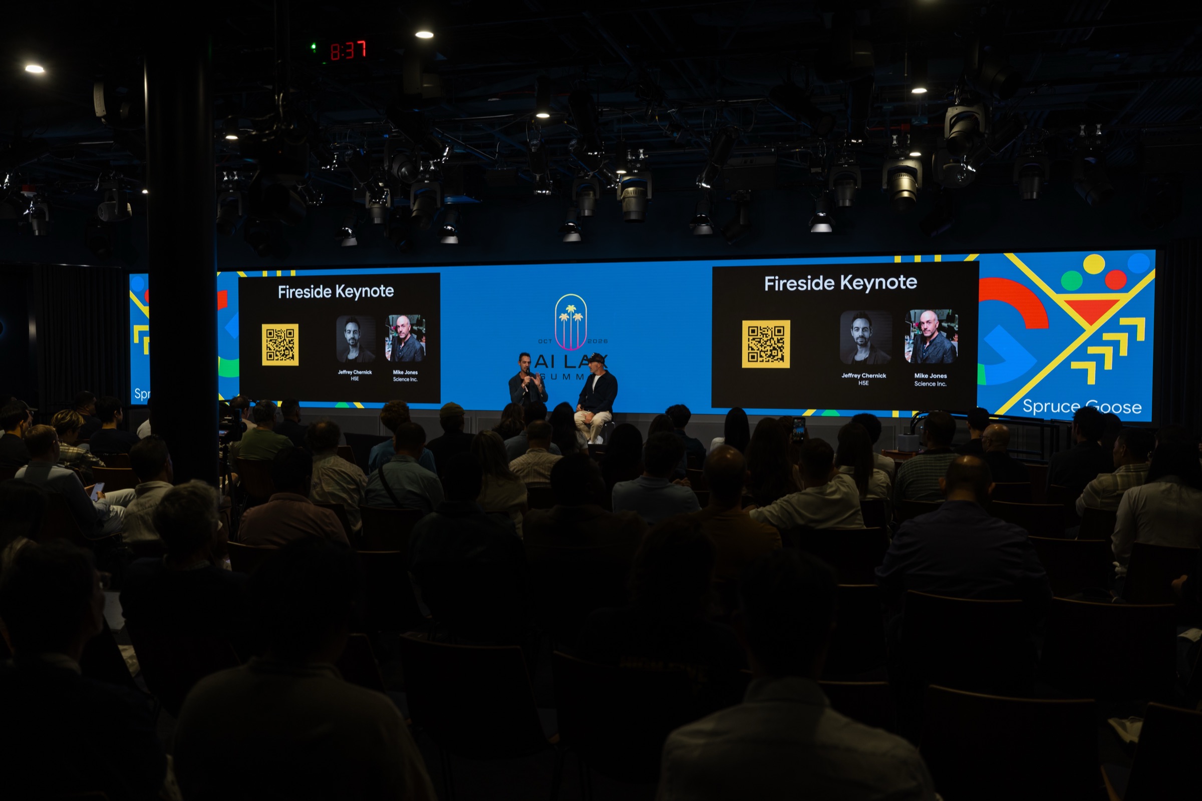 Audience watching Michael Jones and Jeffrey Chernick during a fireside keynote at the AI LAX Summit