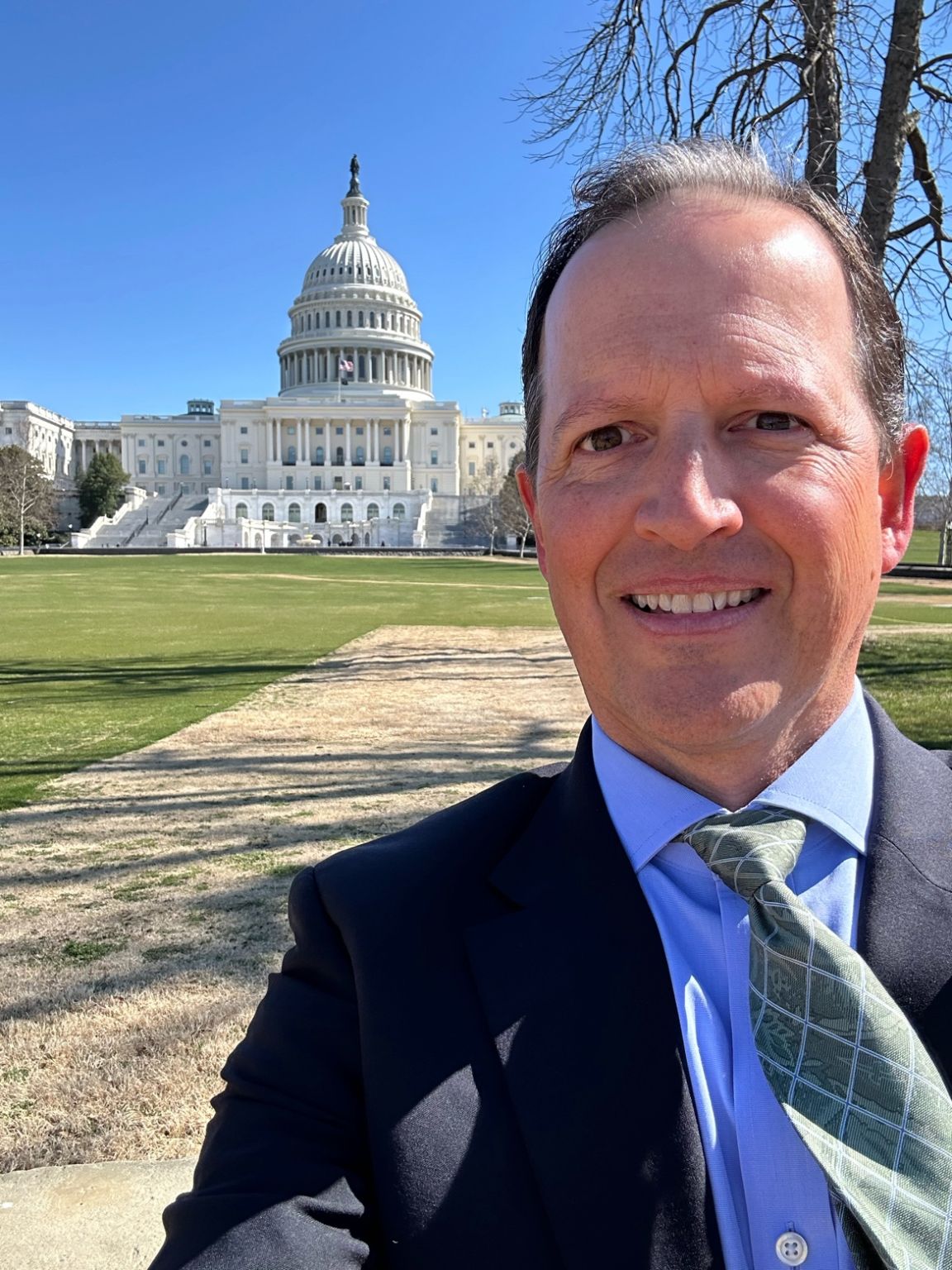 Michael Keimig taking a selfie outside the United States Capitol during a surety legislative fly-in