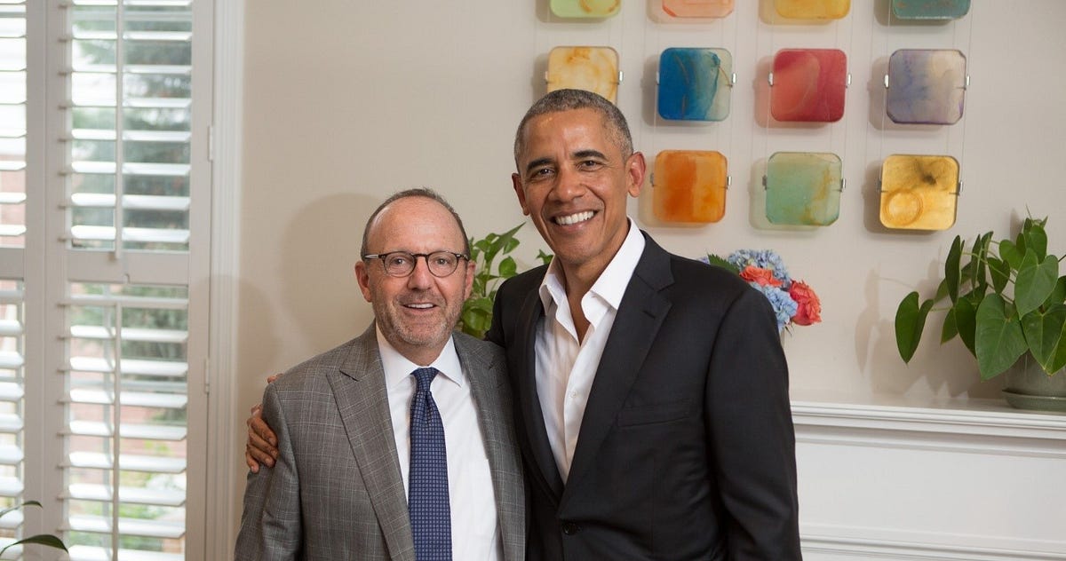 Michael Kempner standing beside former President Barack Obama
