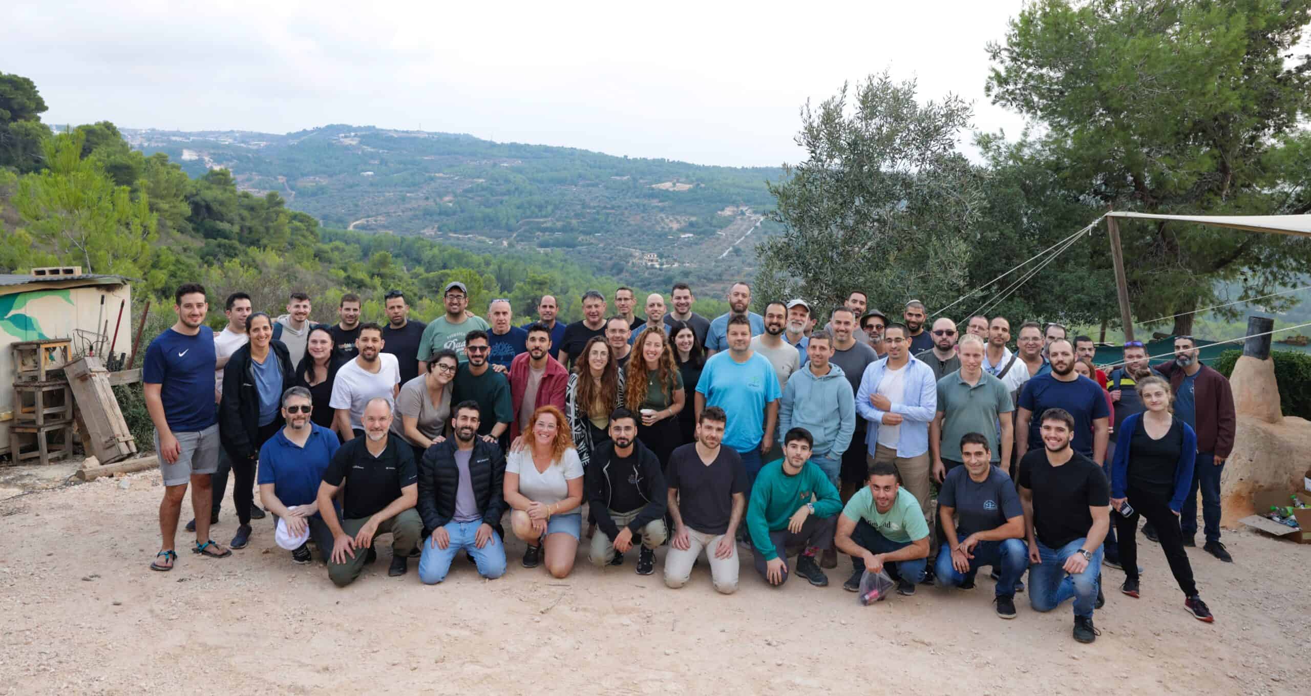 Istra colleagues gathered outdoors for a company group photograph