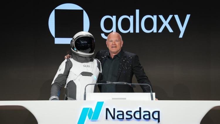 Michael Novogratz at Galaxy’s Nasdaq opening-bell ceremony beside a person in an astronaut suit