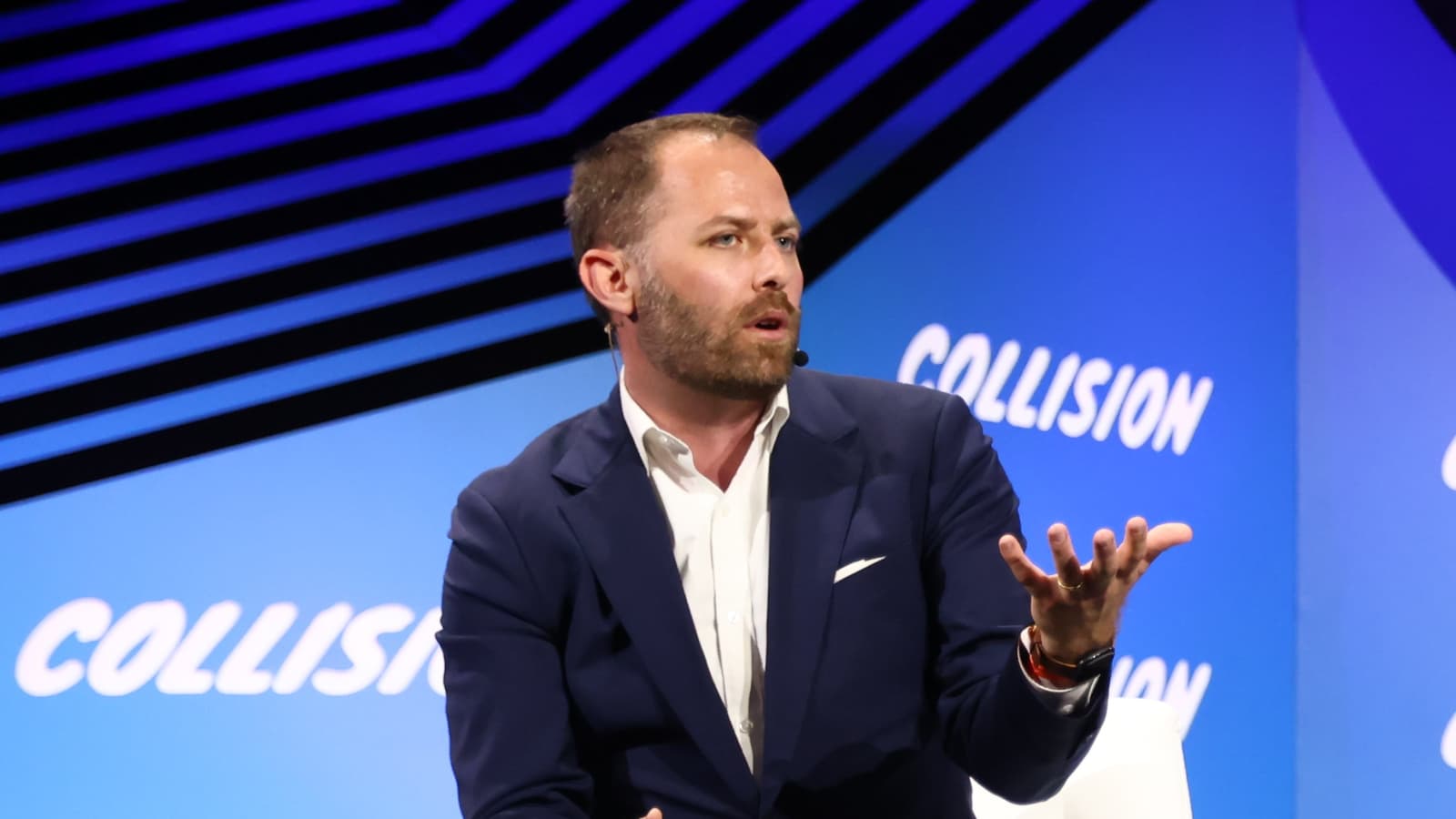Michael Ramlet speaking onstage at the Collision technology conference