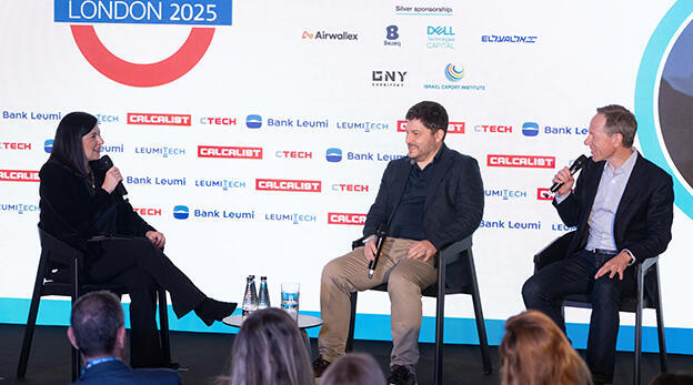Sophie Shulman interviews Michael Reitblat, center, and Chris North on stage at Mind the Tech London 2025
