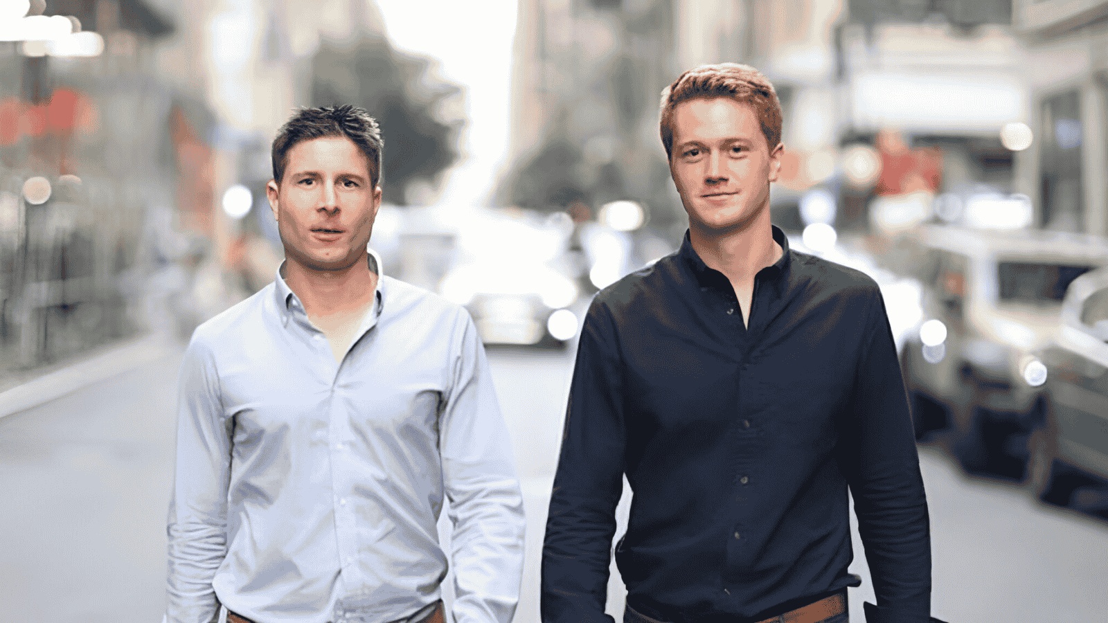 EvolutionIQ co-founders Tomas Vykruta, left, and Michael Saltzman standing on a city street