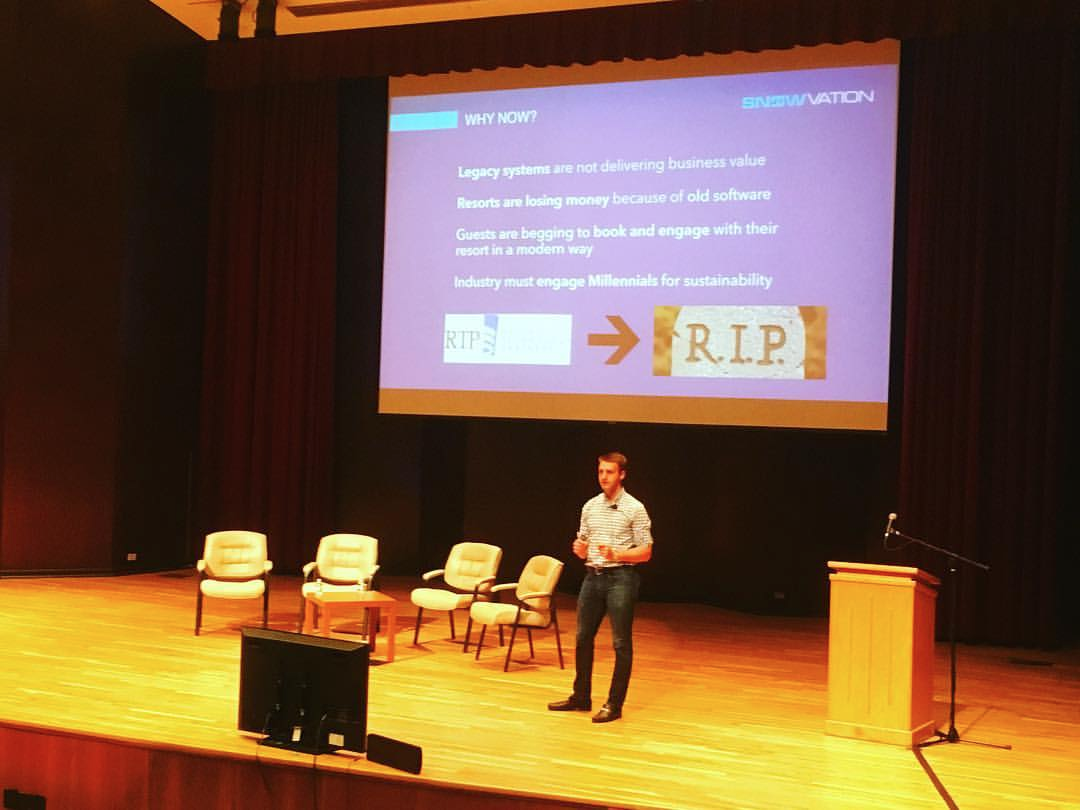 Michael Stocker presenting Snowvation on a stage