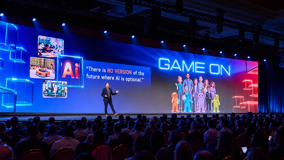Michael Weening speaking on the Calix ConneXions main stage beneath a Game On display