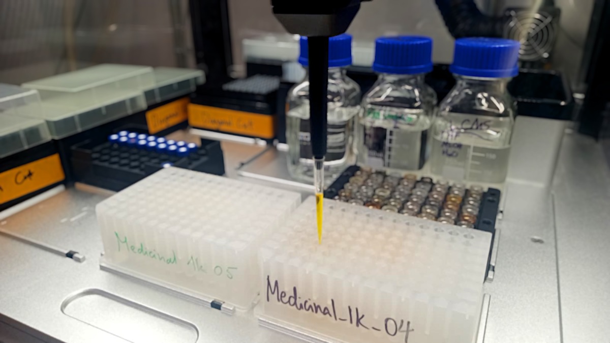 Liquid-handling automation at Yoneda Labs filling a reaction plate