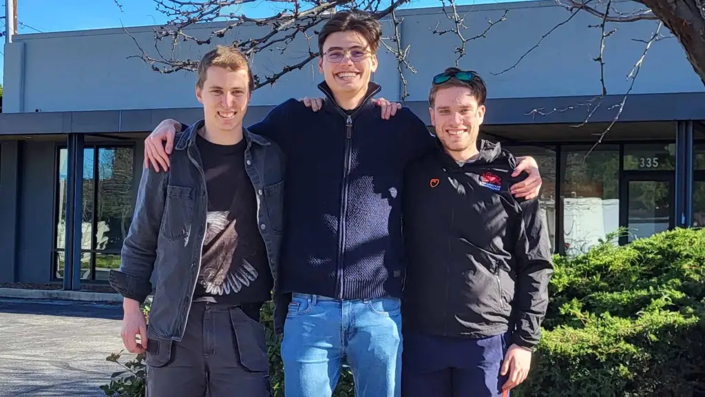 Yoneda co-founders Jan Oboril, Michal Mgeladze-Arciuch and Daniel Vlasits standing together outside