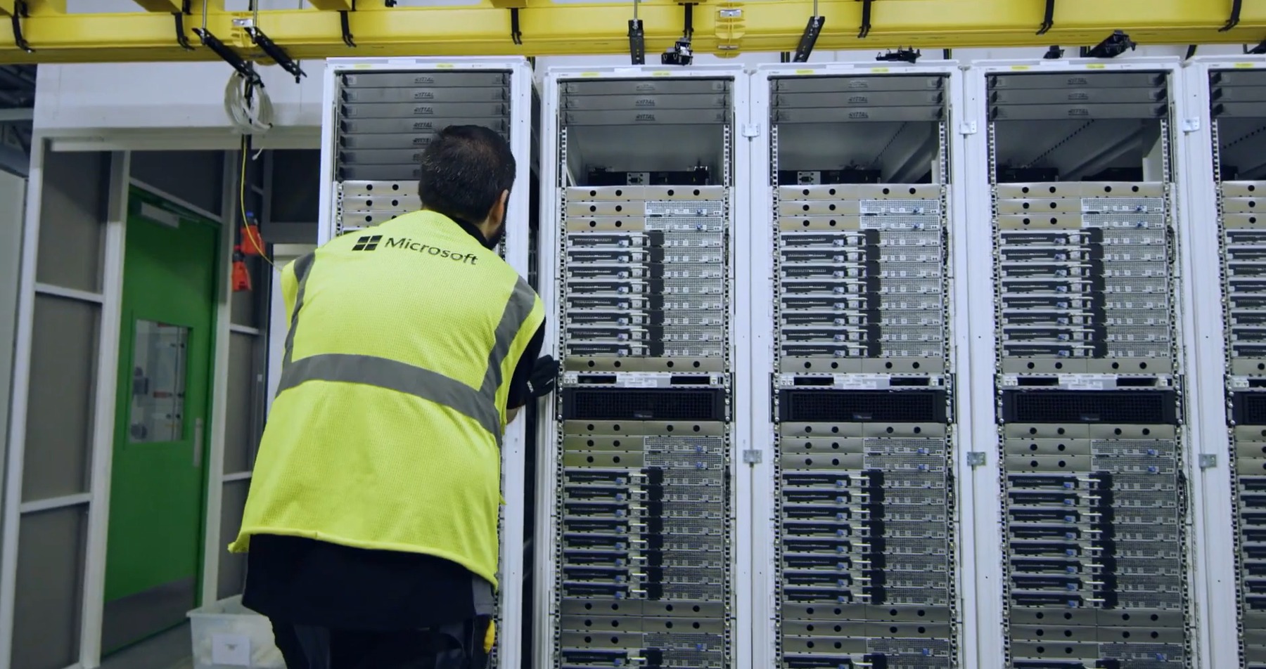 A technician working inside a Microsoft Azure datacenter