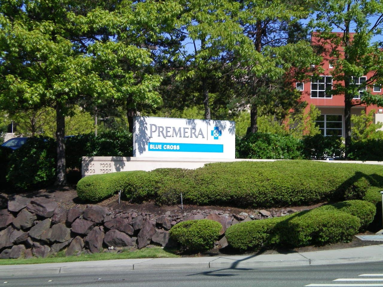 Premera Blue Cross sign at its tree-lined Mountlake Terrace campus