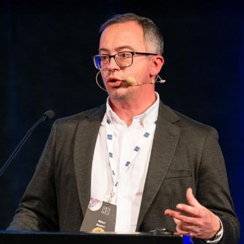 Mihai Raneti speaking at a technology conference