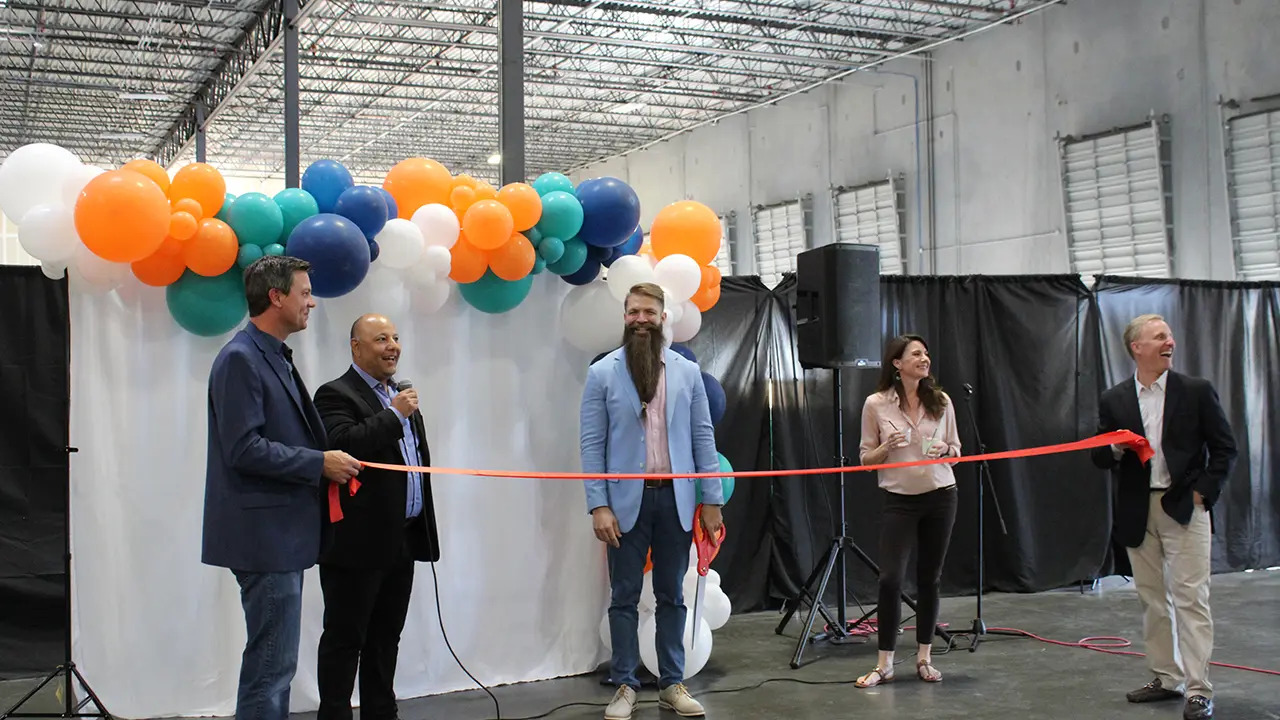 Mike Francis and colleagues at the ribbon cutting for NanoTech Materials' Katy facility