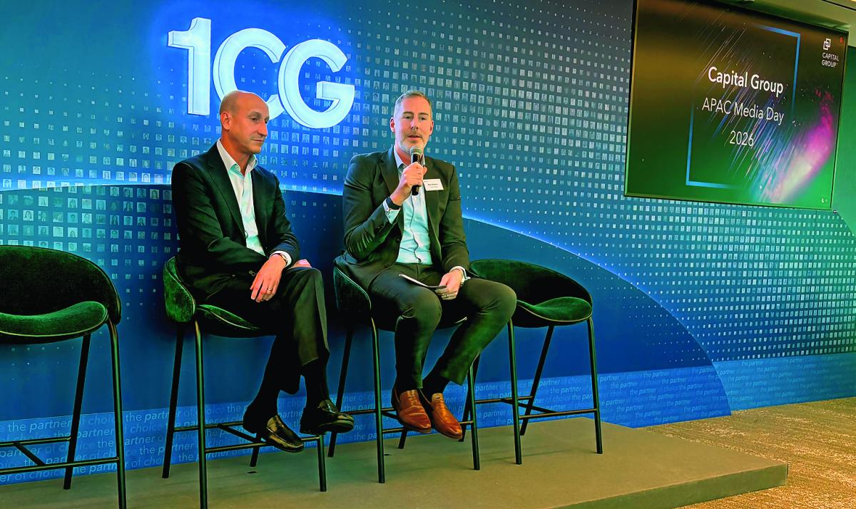 Mike Gitlin, left, seated beside Capital Group communications executive Mark Walters at the 2026 APAC Media Day