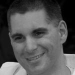Archival black-and-white photograph of Mike Lantz from his Clarity profile