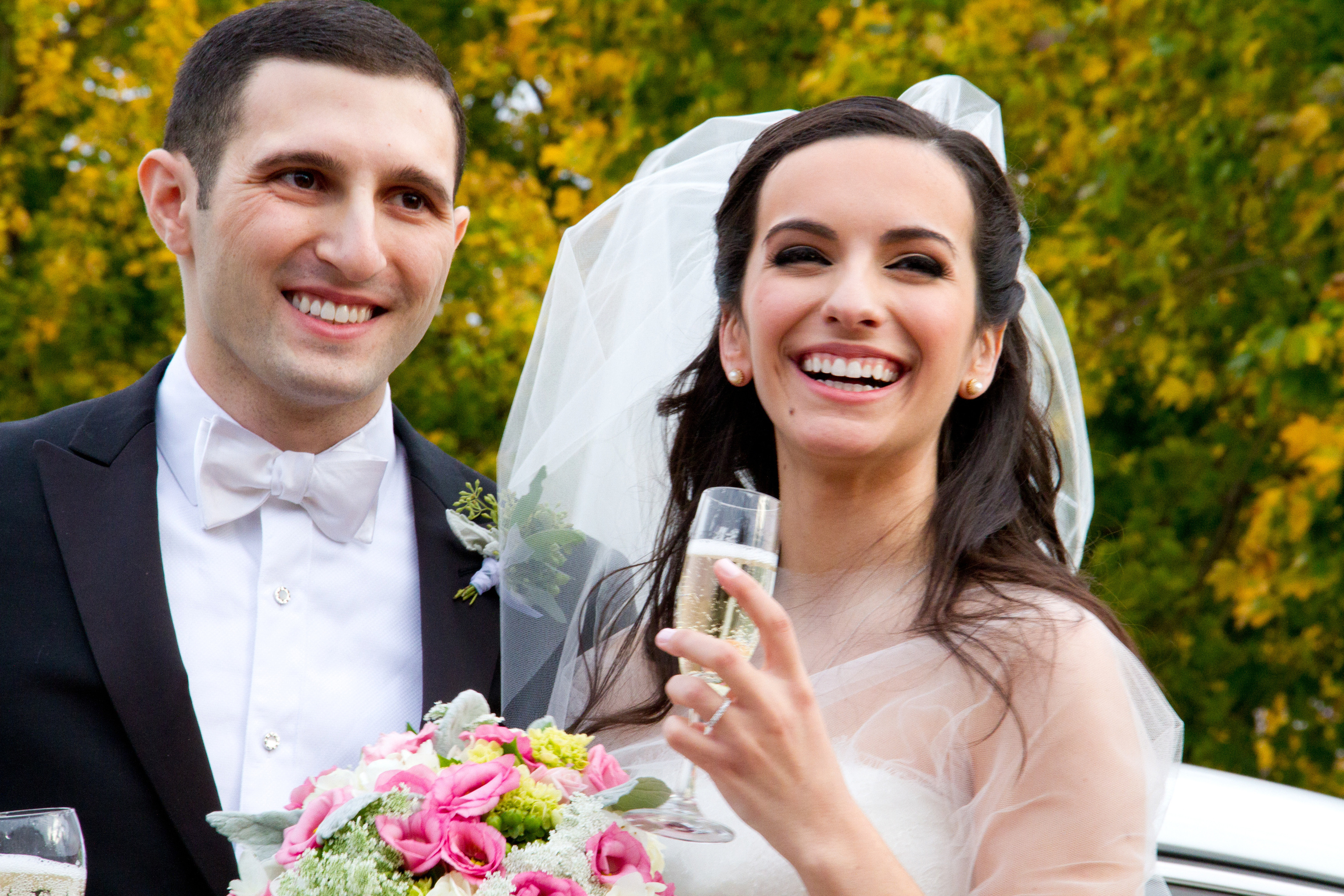 Mike and Marissa Rosich smiling at their wedding
