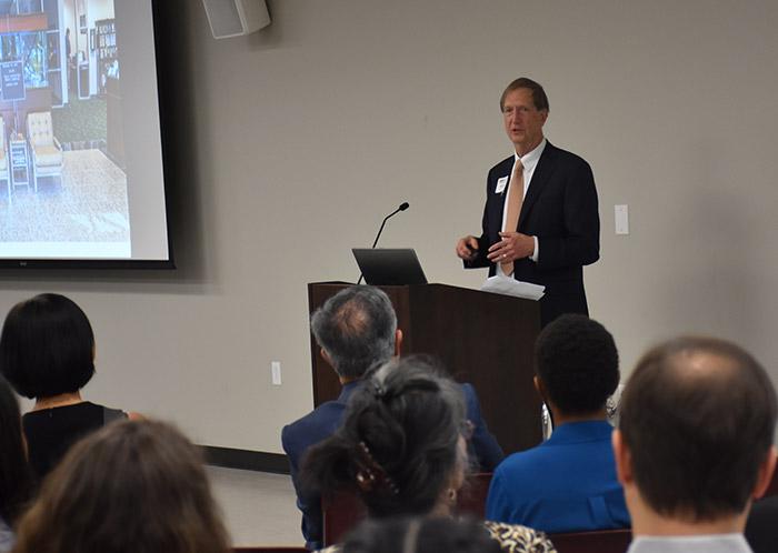 Mike Rydin speaking to an audience at the University of Houston-Victoria Katy campus