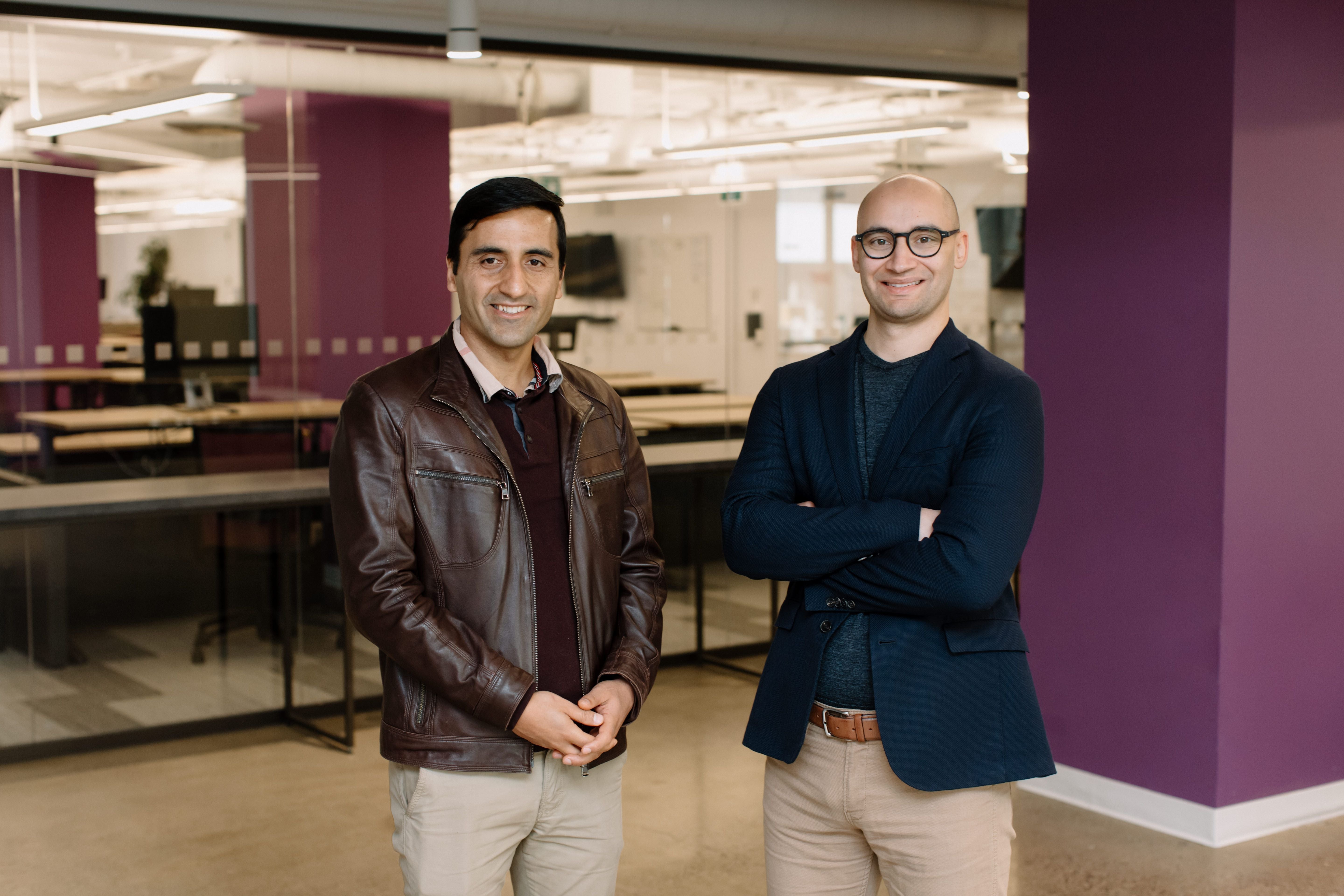 Top Hat co-founders Mohsen Shahini, left, and Mike Silagadze, right, in an office