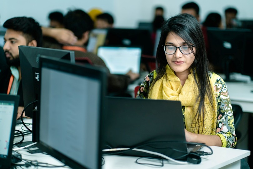 Employees at work in Quantanite’s Bangladesh operation