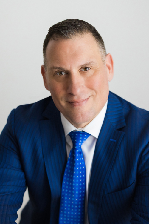 Official portrait of Mindex founder and president Marc C. Fiore