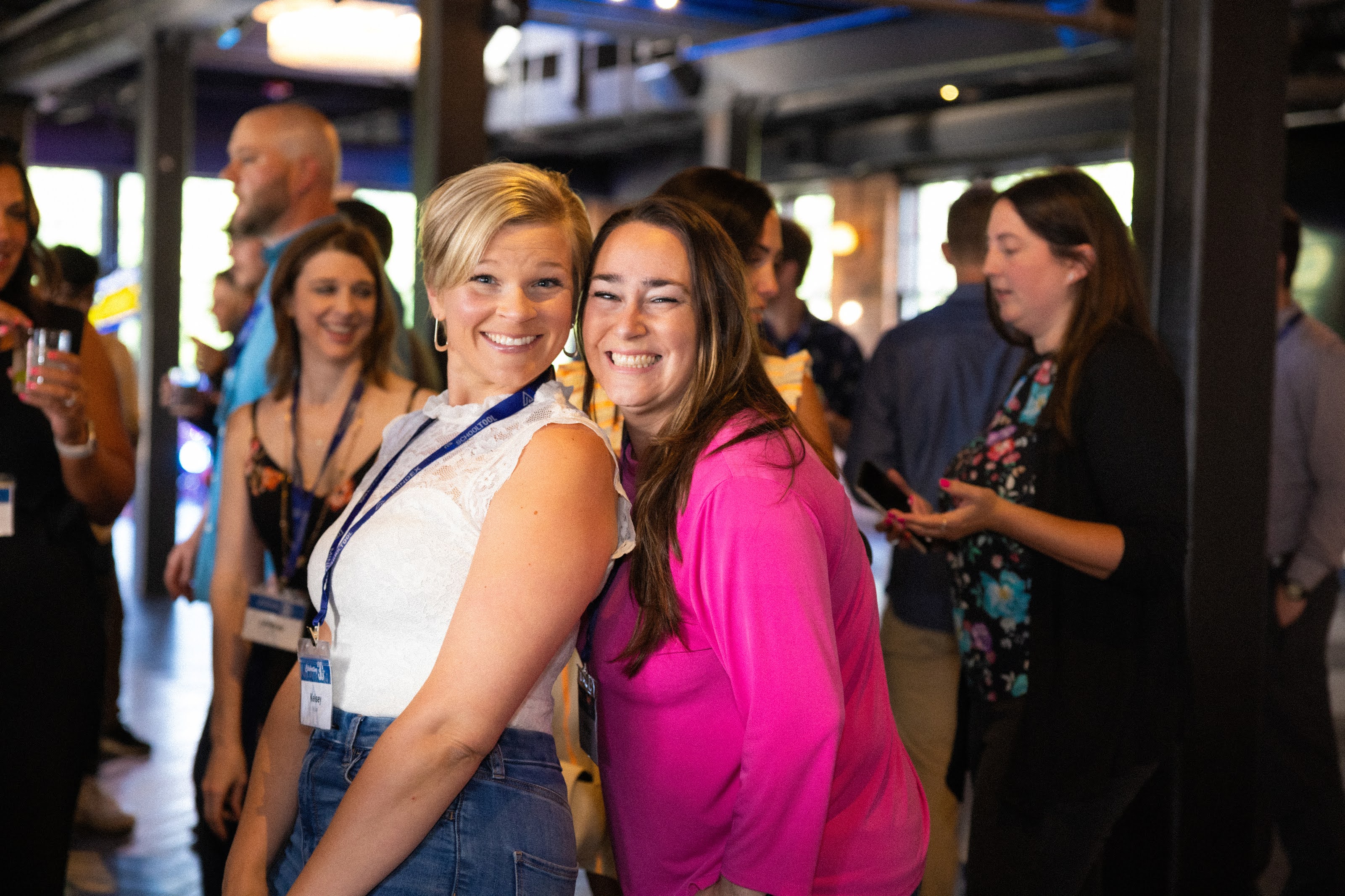 Attendees smiling at Mindex’s 30th-anniversary celebration