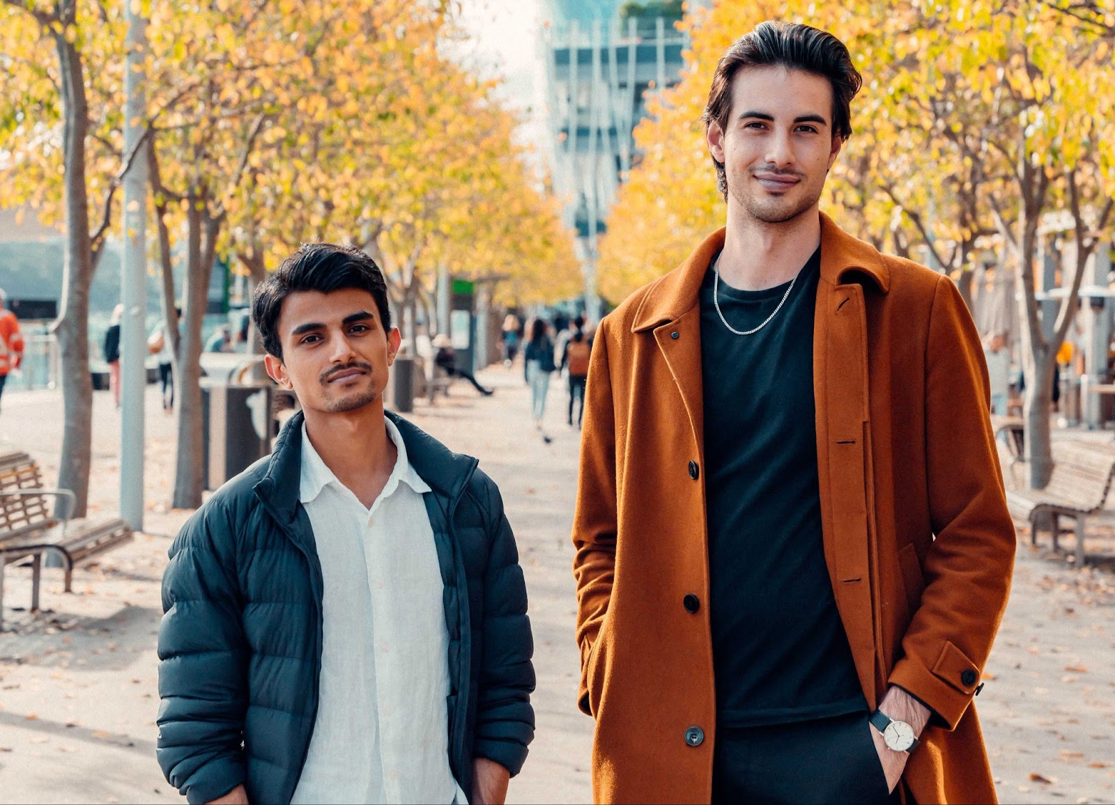 Anuj Paudel on the left and Misha Cajic on the right, standing outdoors