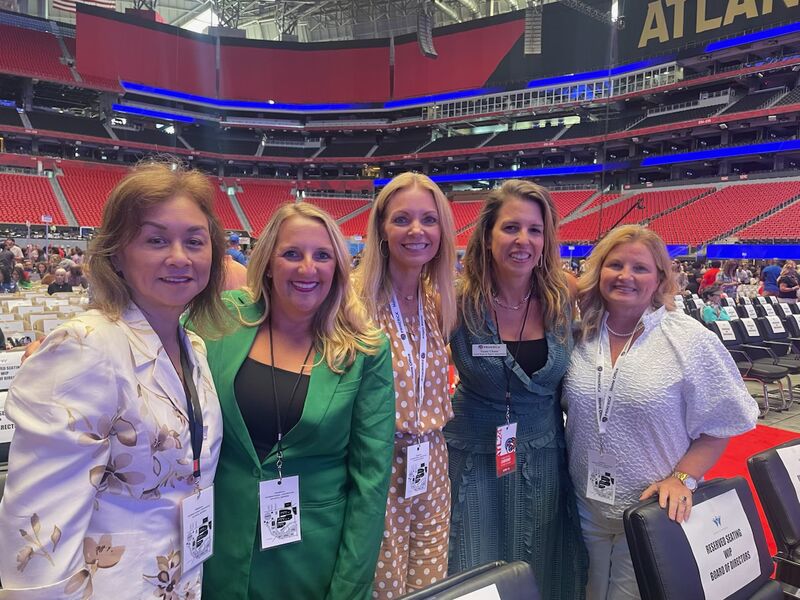 Misty Sutton, second from left in green, with fellow attendees at Primerica’s 2024 convention