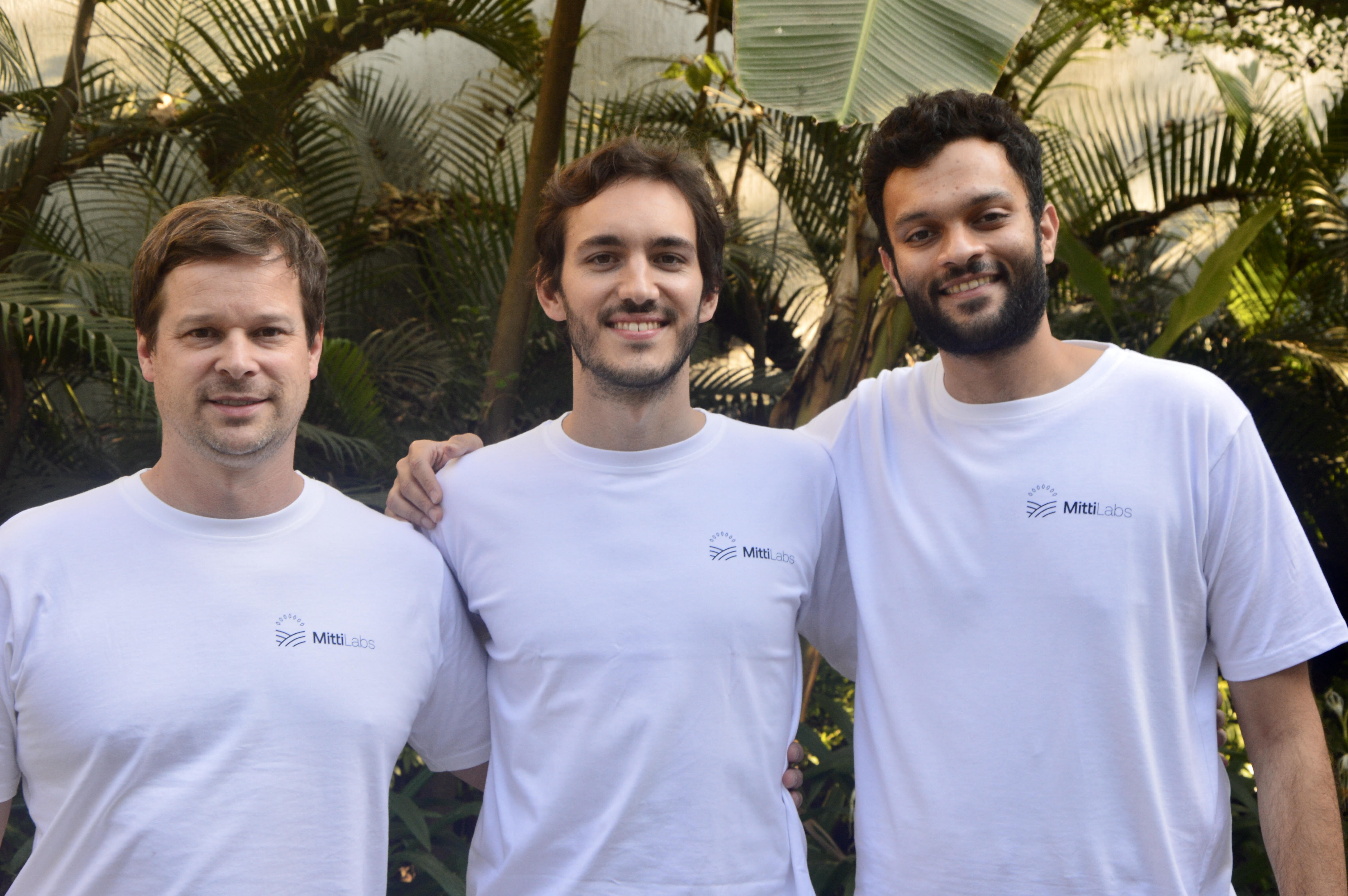 Mitti Labs founders Nathan Torbick, Xavier Laguarta Soler and Devdut Dalal standing together outdoors