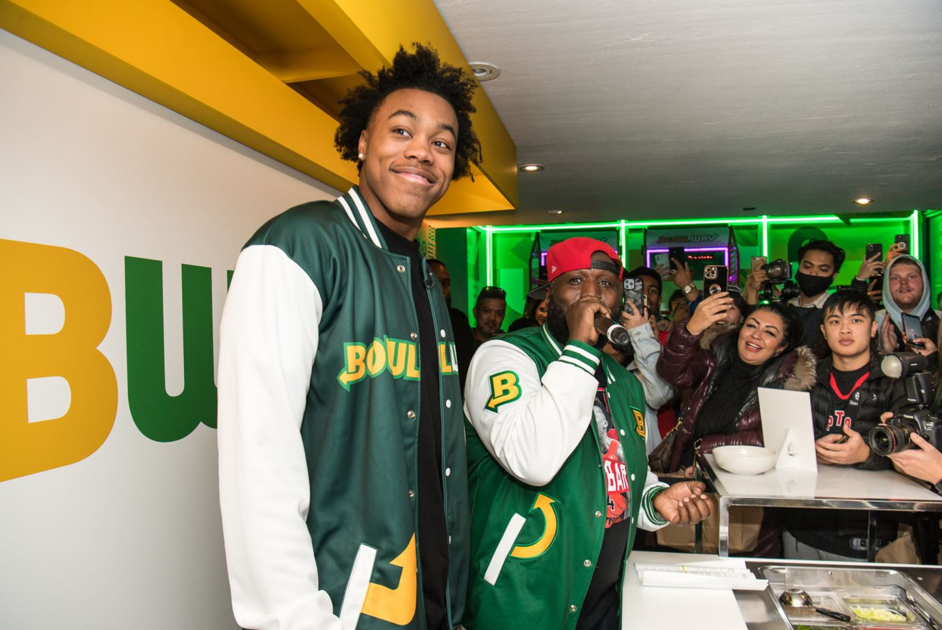 Scottie Barnes and a performer at Subway Canada's Bowlway pop-up