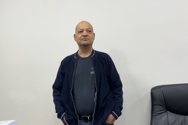 Mo Tahmasebi standing during a 2024 California press visit