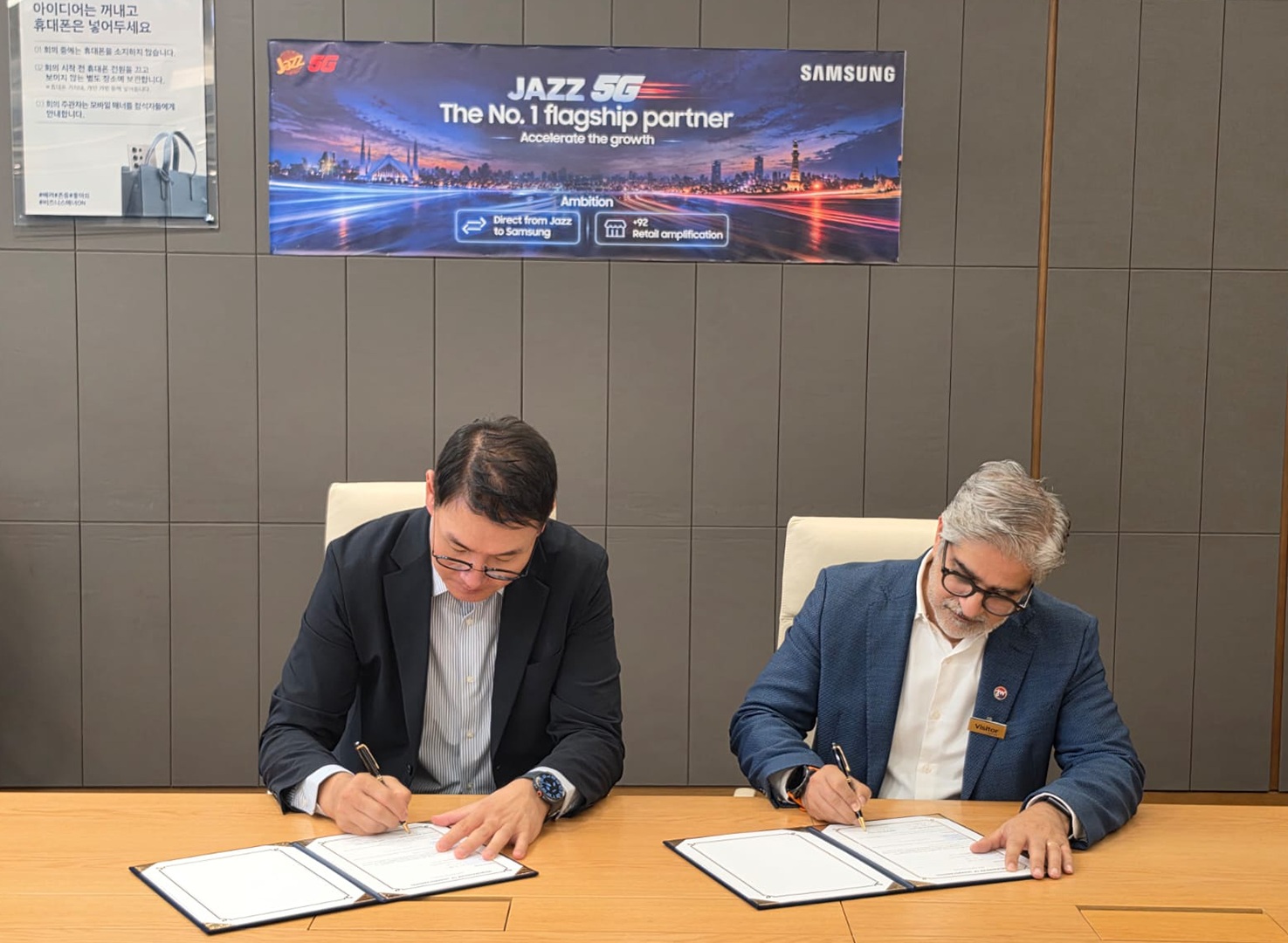 Jazz and Samsung representatives sign their October 2026 partnership in Suwon, South Korea