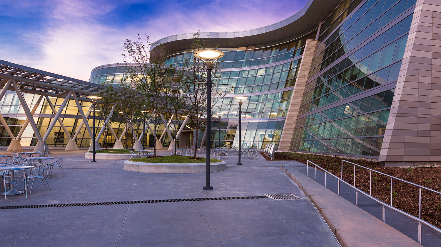 Curving glass facade and courtyard at the Salt Lake City Public Safety Building