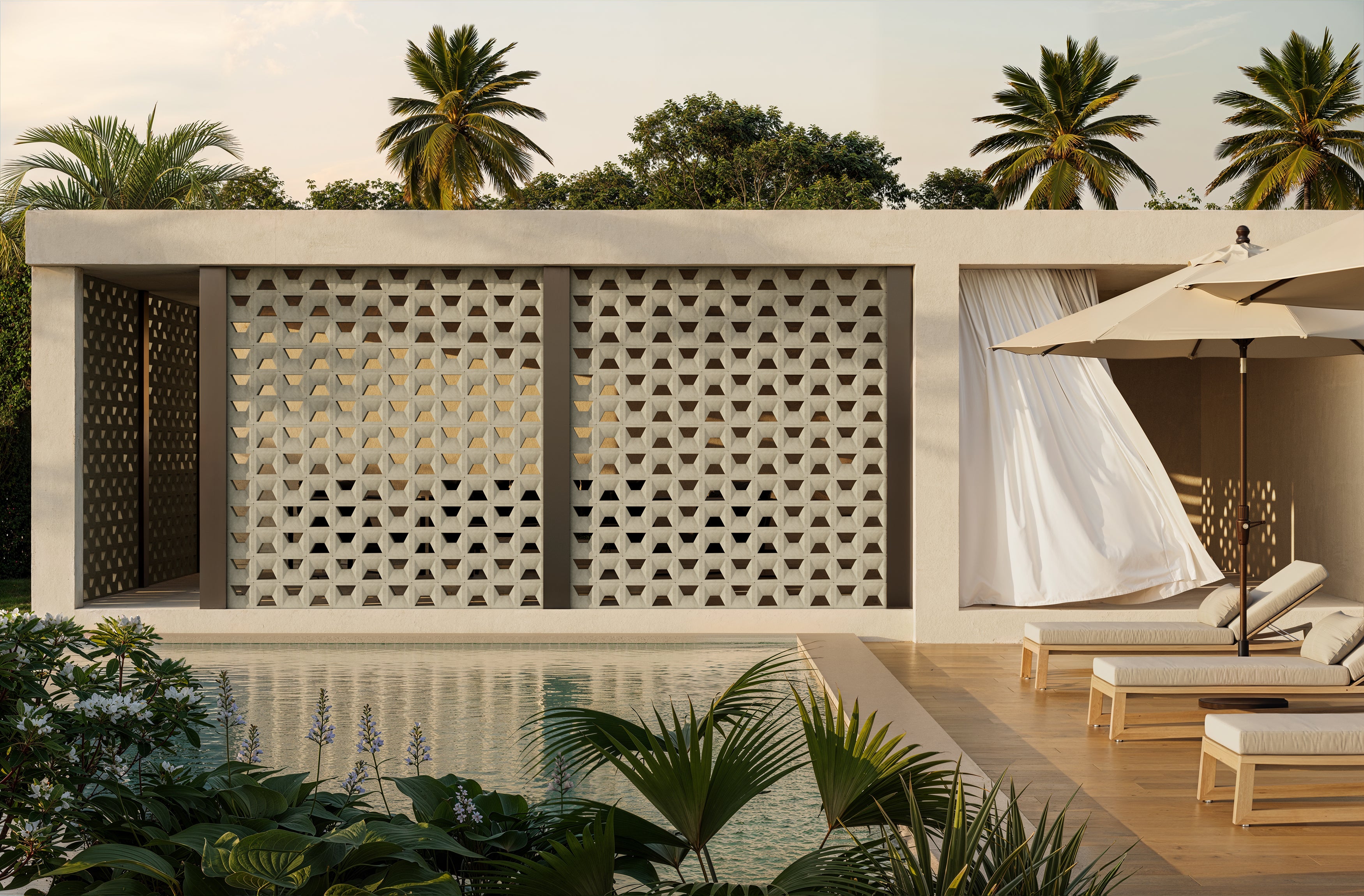Architectural concrete breeze-block screens beside a tropical pool