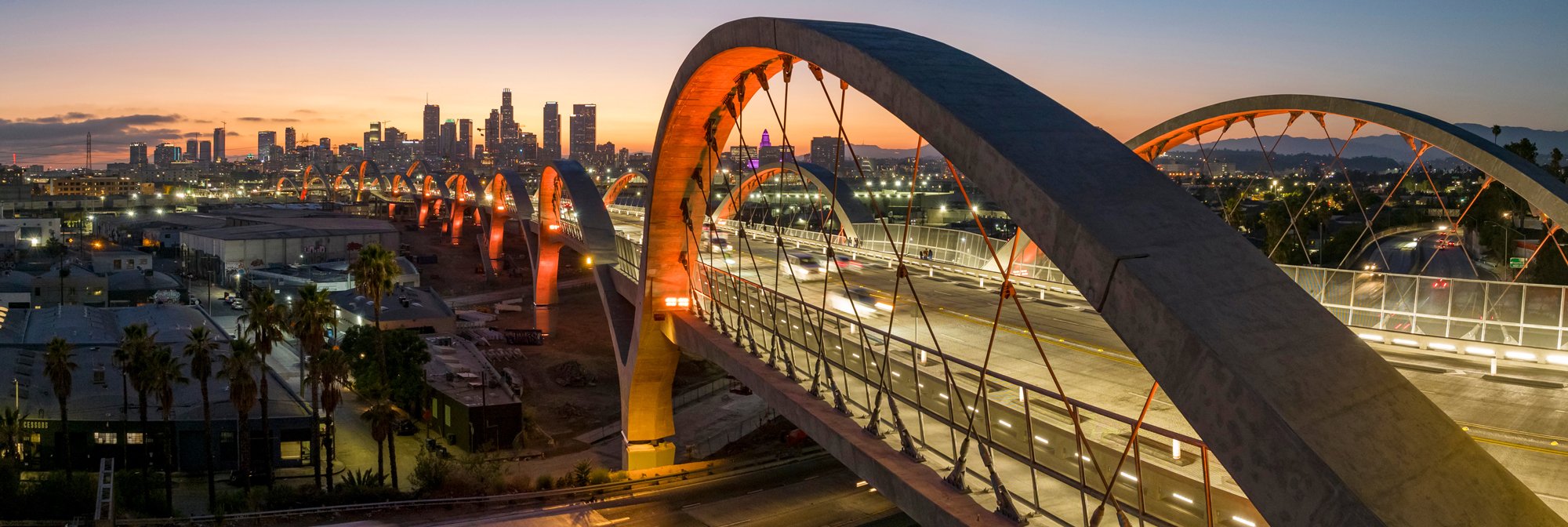 The Sixth Street Viaduct in Los Angeles illuminated at sunset