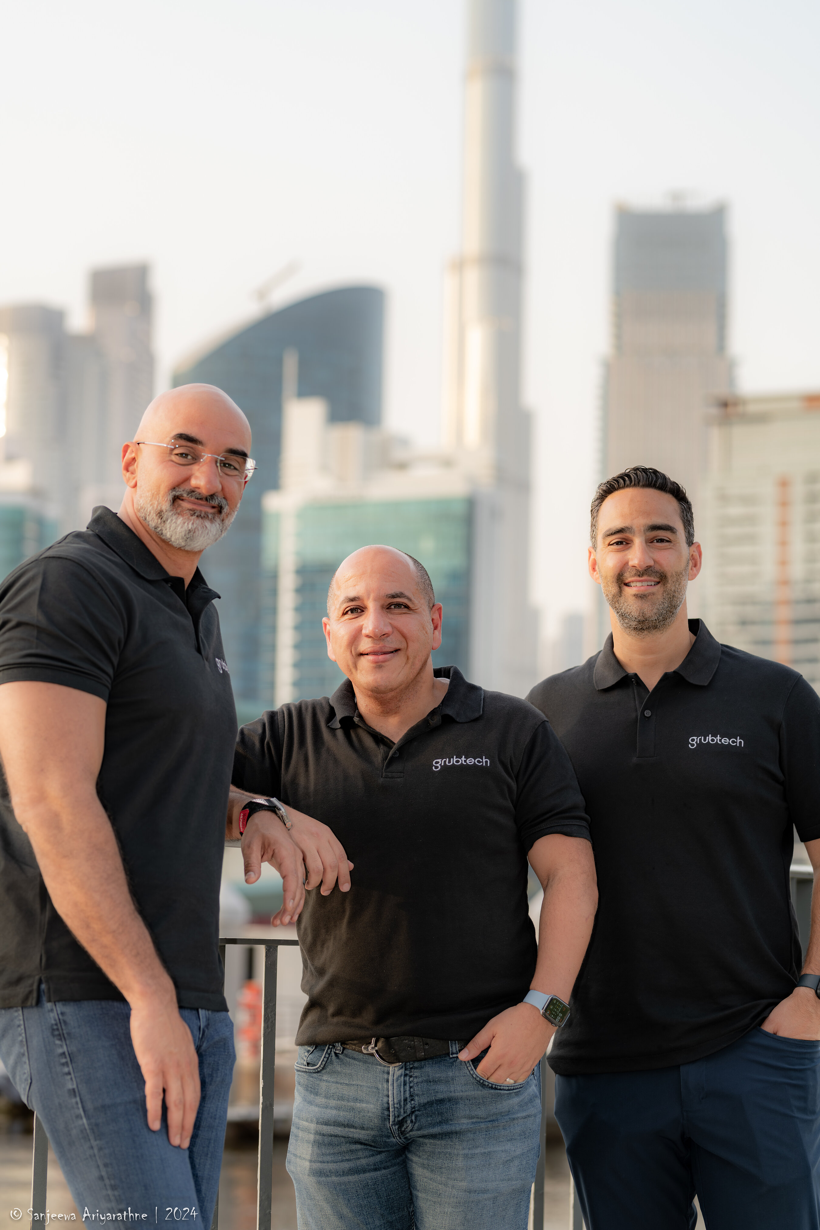 Mohamed Al Fayed, at left, with Grubtech’s founding team against the Dubai skyline